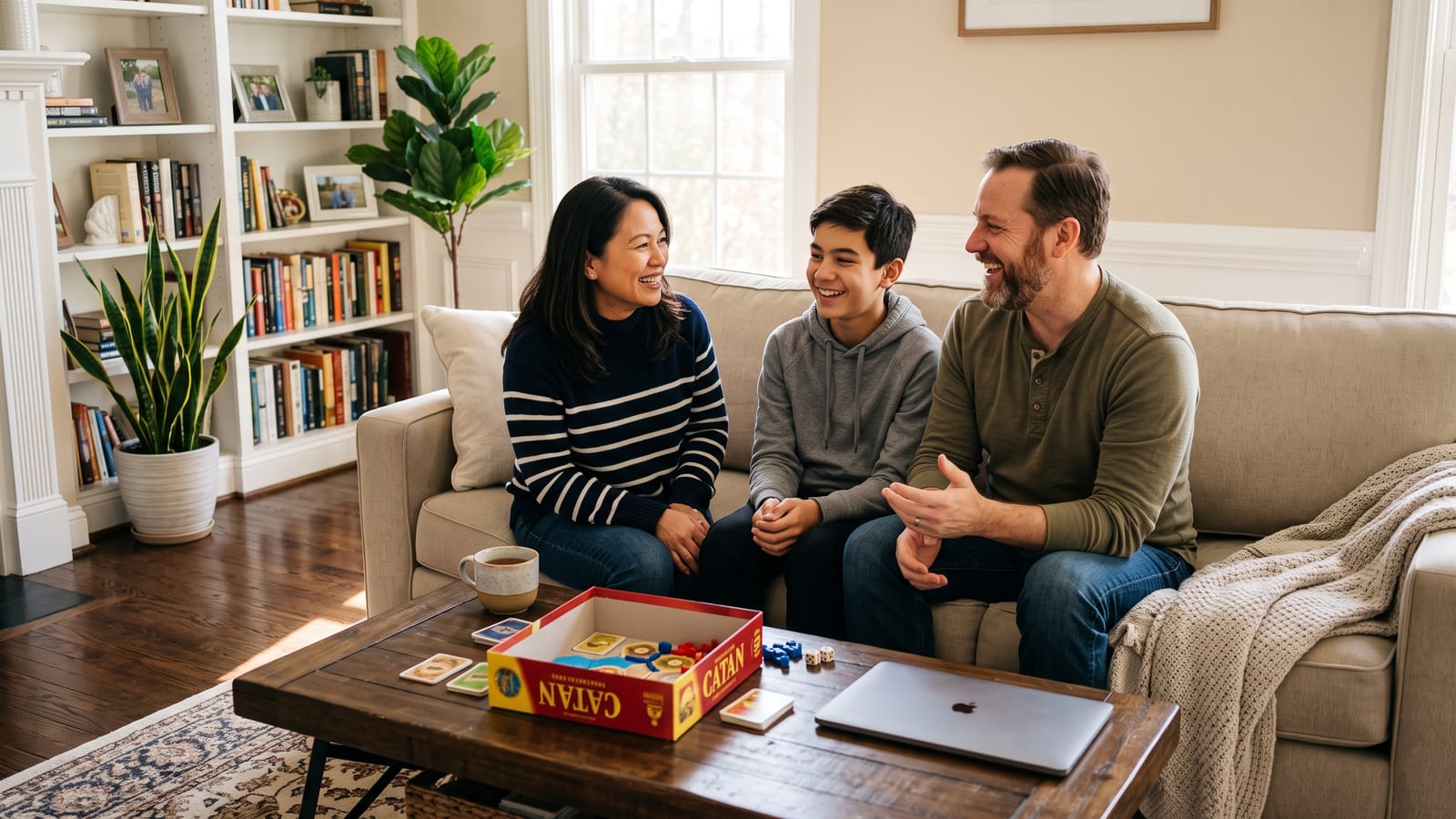 A family at home, relaxed on the sofa